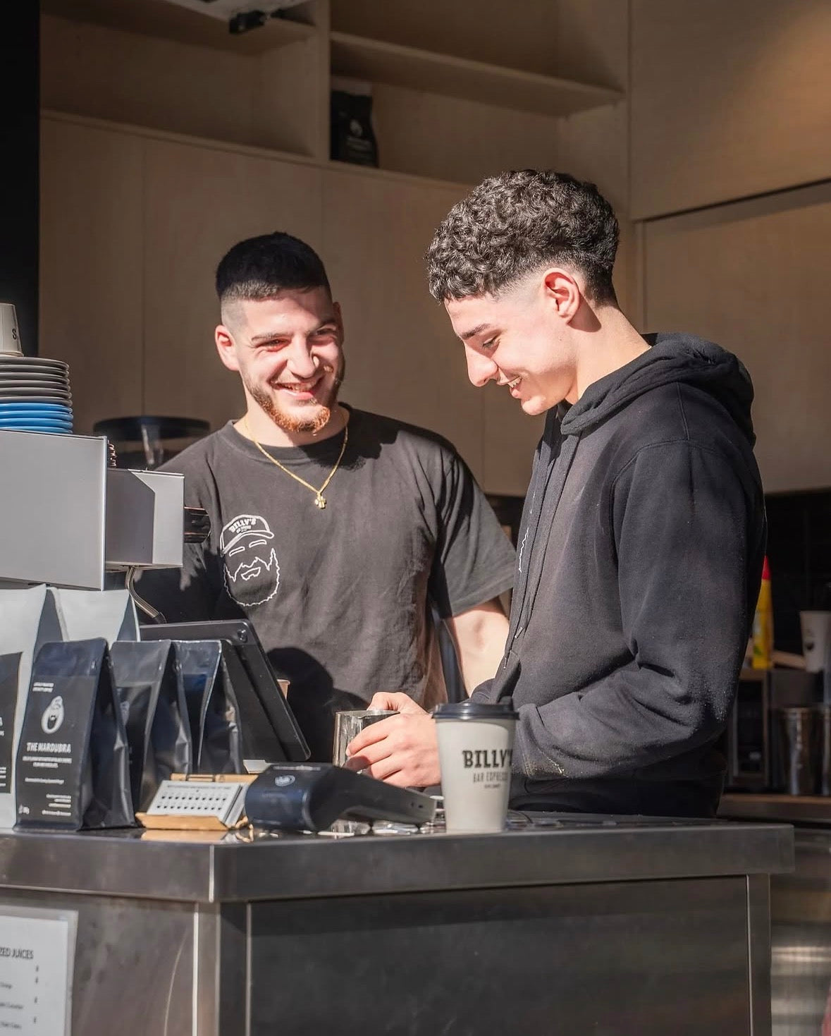 Petros and Ethan working together at Billy's Bar Espresso